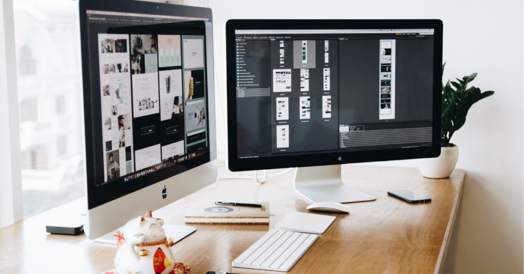 On the journey to How to Star a Blog with Office desk with two monitors, each presenting a different aspect of a versatile WordPress theme.